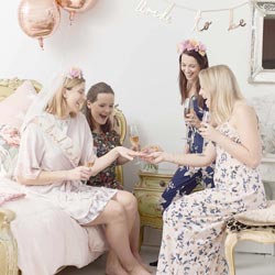 A lifestyle shot of a group of girls wearing the headband.