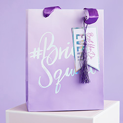 The bags come with a purple tassel.