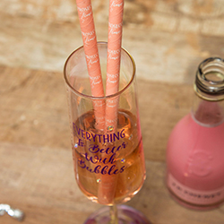 Two of the straws in a glass.