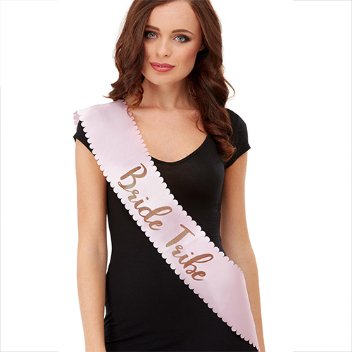Pink sash with rose gold team bride text.