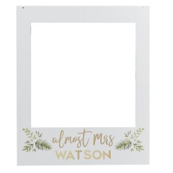 The frame with Almost Mrs Watson written on the front.