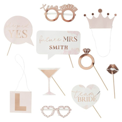 Rose gold photo booth props on a white background.