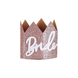 A rose gold crown with bride written in white.