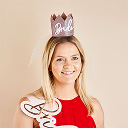 Somebody wearing the crown which also has a veil.