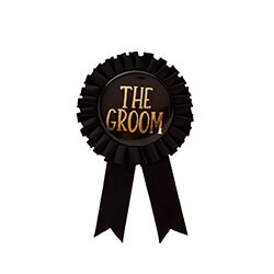 A black rosette badge with gold text on a white background.