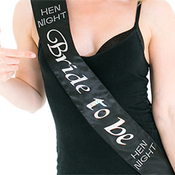 Wearing the sash with a black vest top
